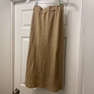Tan size small midi skirt with side slit.